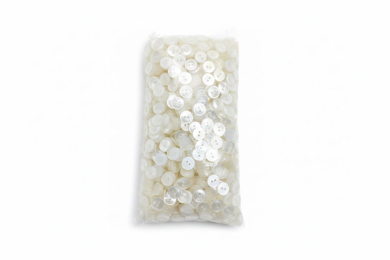 Paquete (Mazo) de Botones T24/2 —Blanco trasparente