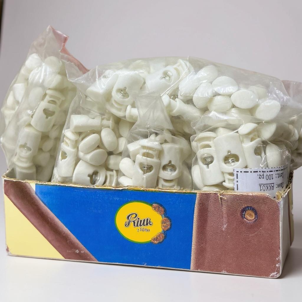 Ahorcador de cilindro KK521 – color blanco. Paquete de 100 piezas .